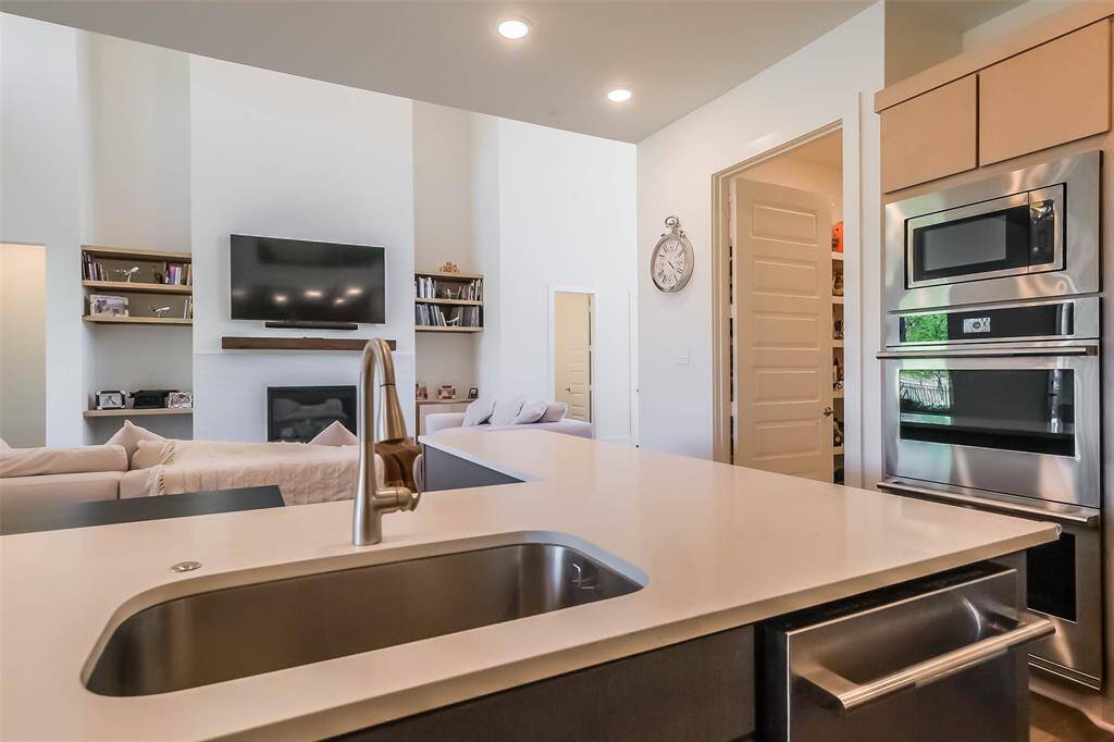 Even the 5 burner gas range and upgraded hood vent, look inviting. This home is like brand new!
