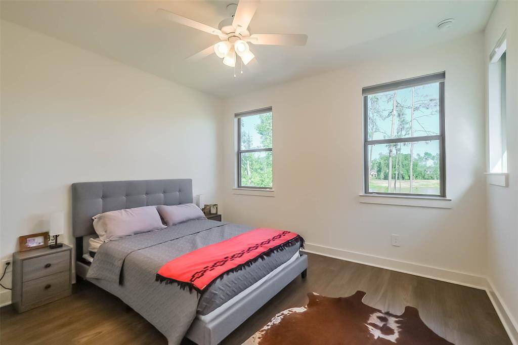 Bedroom 3 Upstairs, also features lovely views of the water and surrounding trails and green space.