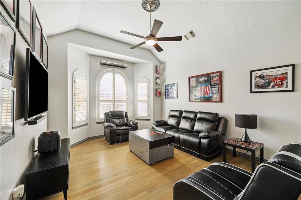 This secondary bedroom is currently being utilized as additional office space.