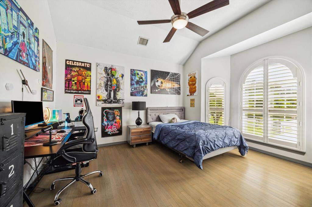 This secondary bedroom is currently being utilized as a sports den. It has a connected full bathroom.