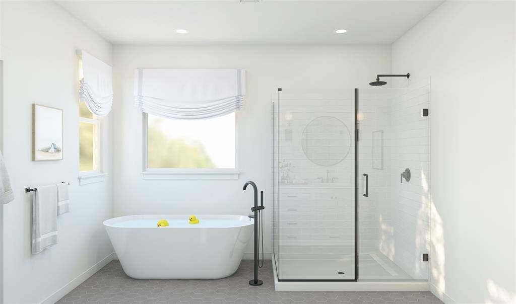 Freestanding tub and large shower in primary bath (*Artist rendering used for illustration purposes only.)