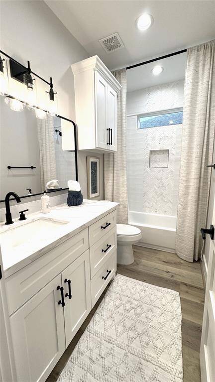 Bath 2 off hall between Primary and 2nd bedroom to service guest