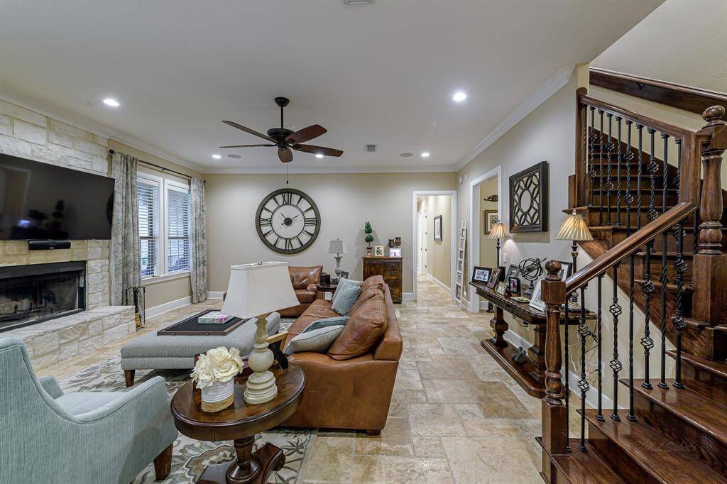On the left of the living room, you'll find a hallway leading to the primary bedrooms and 2 other guest rooms.