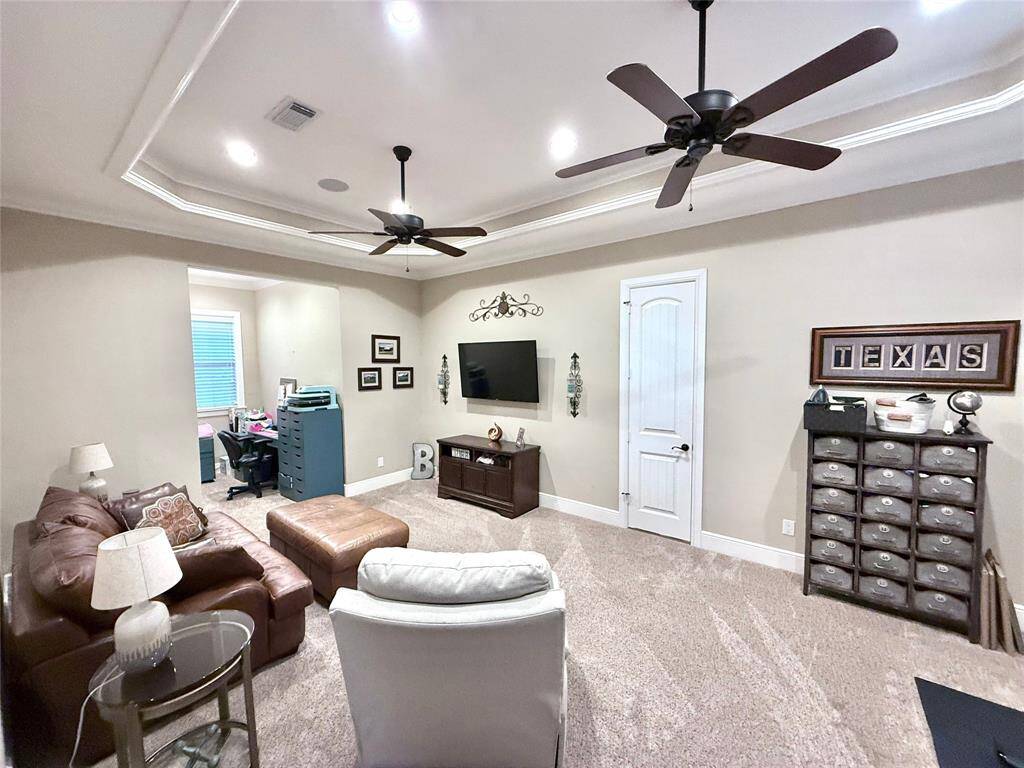 Massive upstairs game room with dormer. An attic branches off game room.