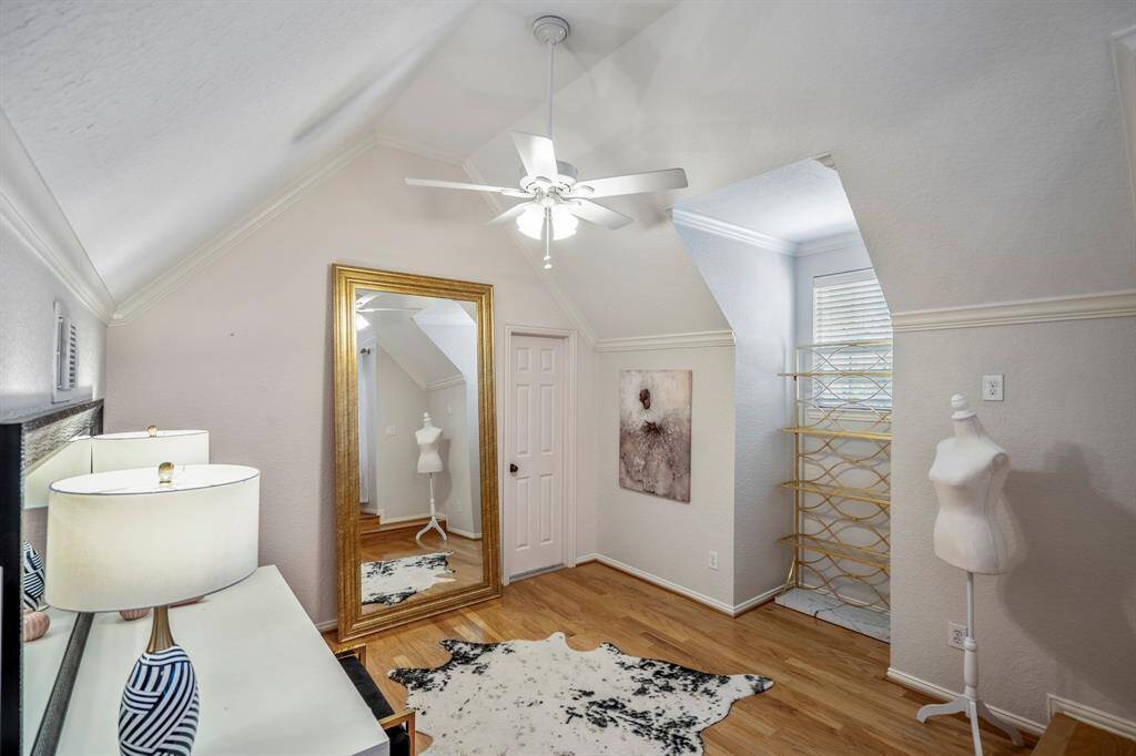 Step into the inviting media room, perfect for relaxation and entertainment.
