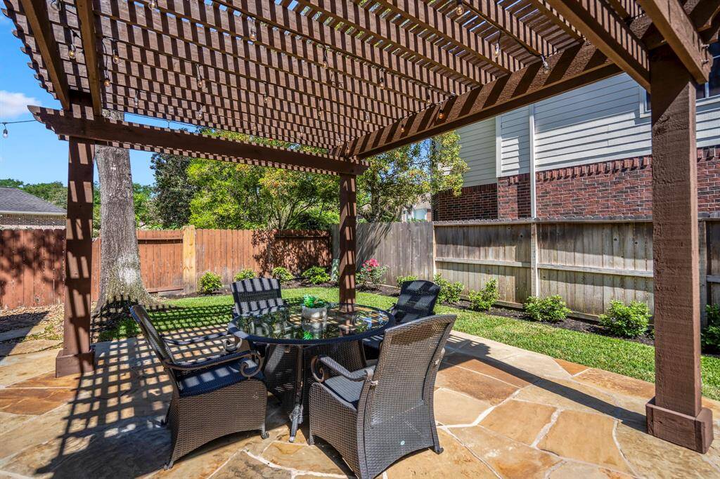 Start your day with a relaxing coffee under the charming pergola.