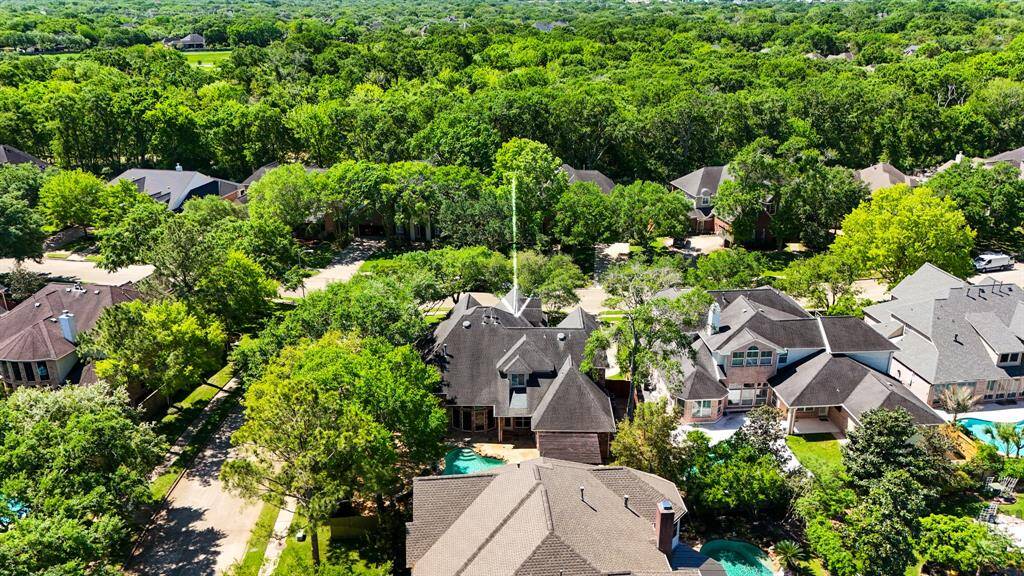 Charming neighborhood nestled among mature trees.