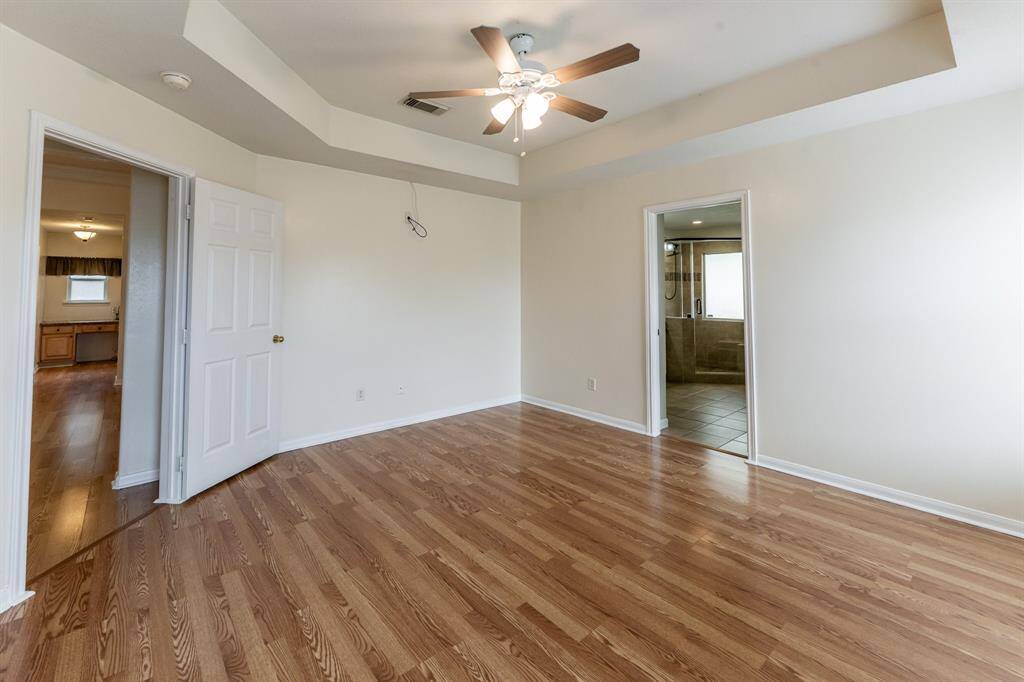 Primary Bedroom with tray ceilings