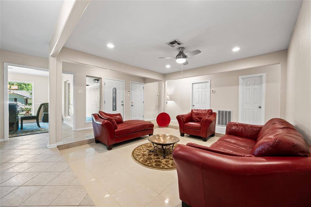 Offering a welcoming atmosphere, relax in this step-down living room located at the heart of the home easily allowing access to other rooms.
