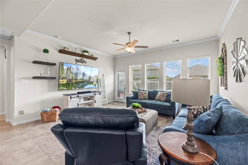 The wall of windows in the family room fill the room with natural light.