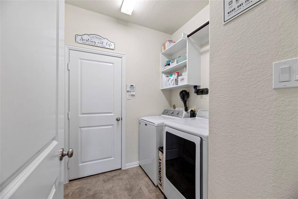 The utility room leads to the garage.