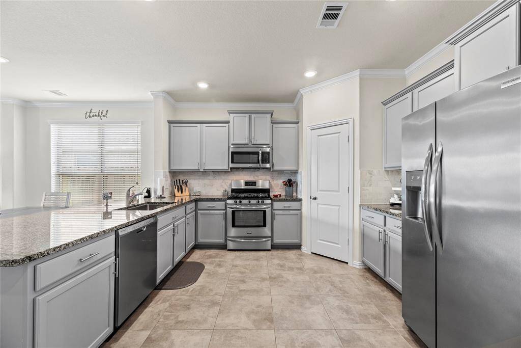 Lots of cabinet space and a walk-in pantry.