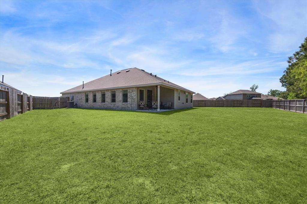 ** Virtually Staged backyard with a pool **