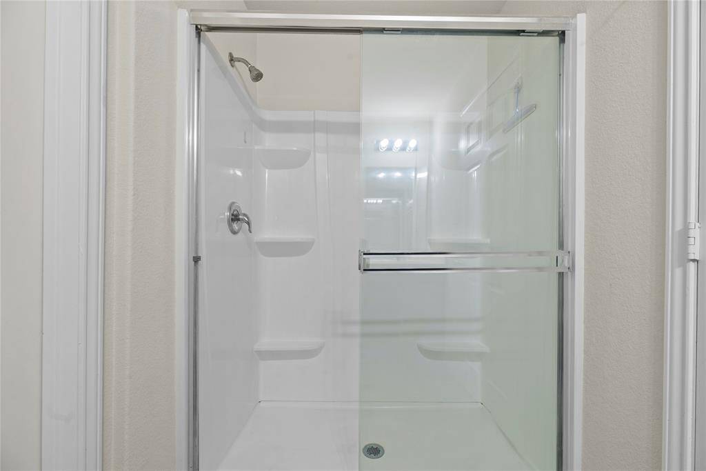 Primary bathroom walk-in shower.
