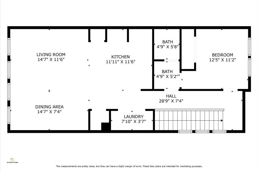 This floor plan features a spacious living room (14'7" x 11'6") adjacent to a dining area (14'7" x 7'4") and kitchen (11'11" x 11'6"). It includes one bedroom (12'5" x 11'2") and one bathroom.  A long hallway (28'9" x 7'4") connects the spaces, and there's a laundry area (7'10" x 3'7"). Suitable for comfortable living with functional layout.