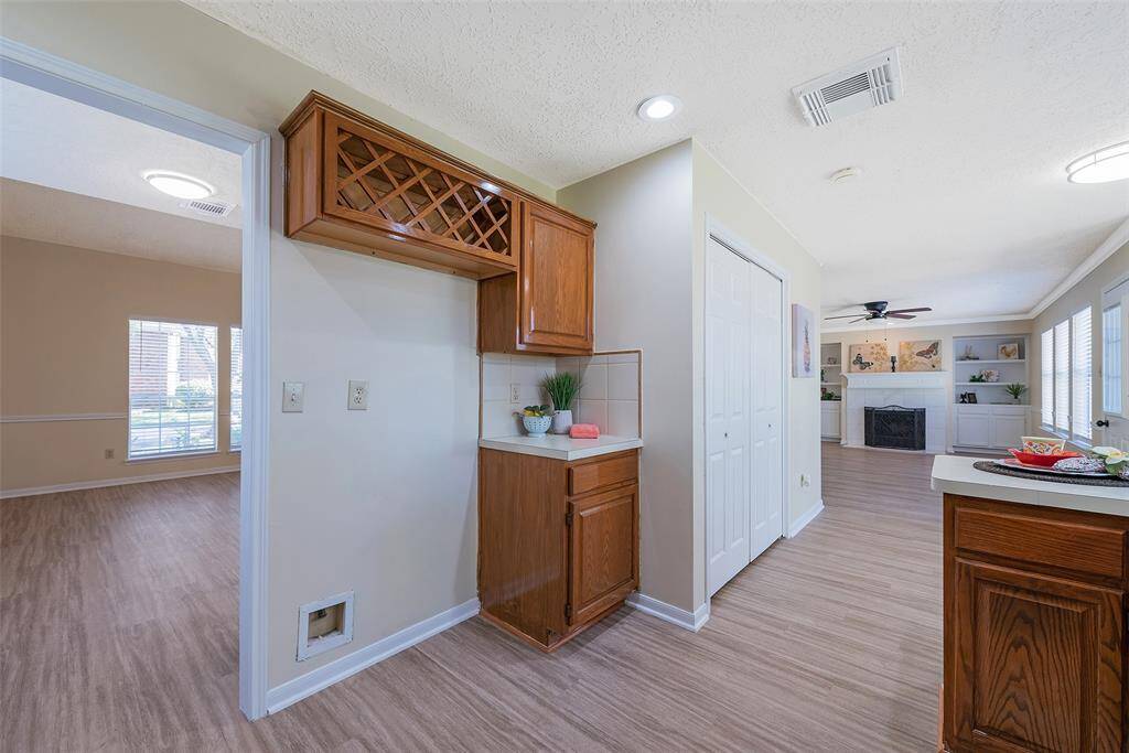 Countertop nook with outlet next to the refrigerator space - perfect for your coffee maker!