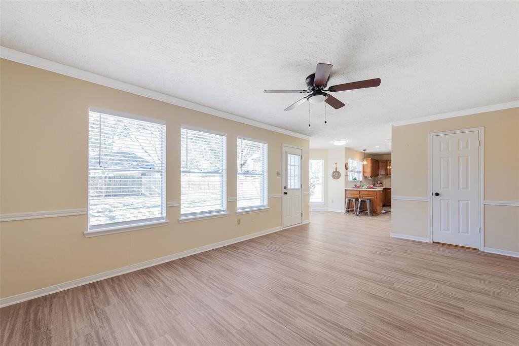 The family room also has a wall of windows that offer great backyard views.