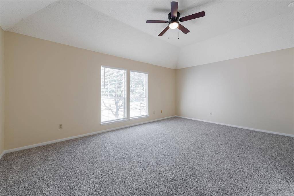 Another look at this spacious primary bedroom.