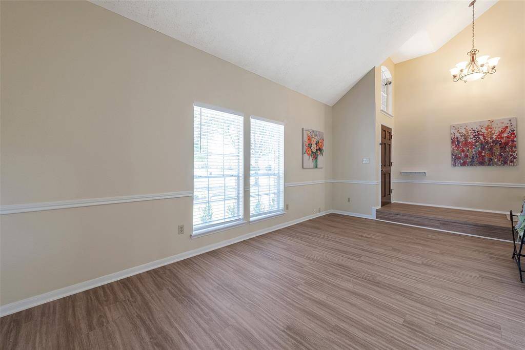 The floor plan is wonderful with a step-down combined formal living & dining room. Spacious & open concept! Windows have blinds & chair-rail molding accents the walls.