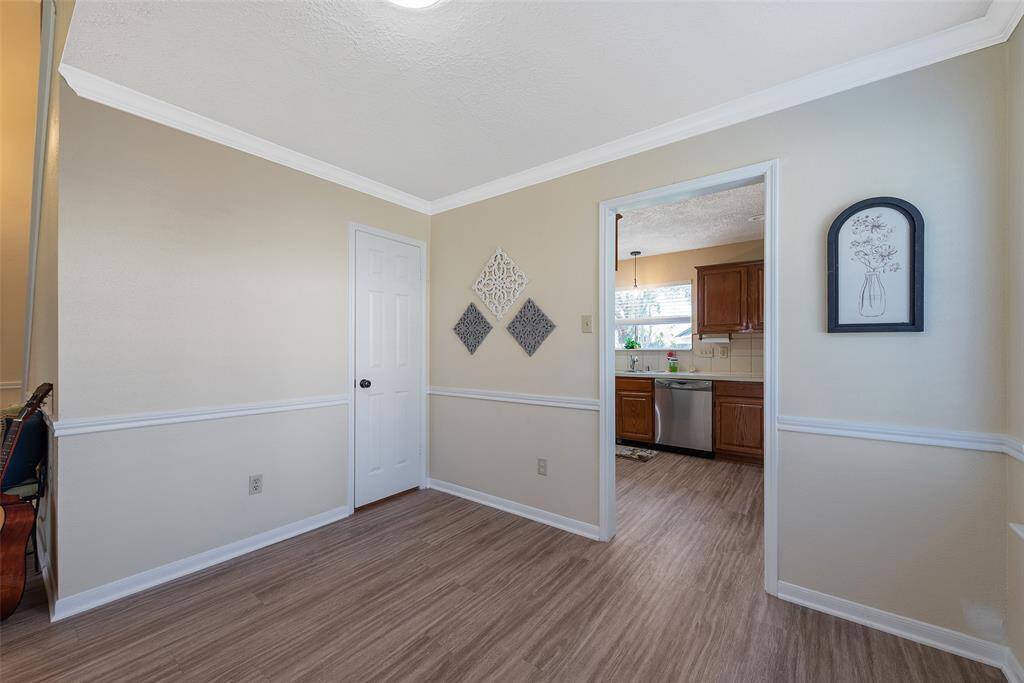 The space leadining into the kitchen. Add a custom butler's pantry for entertaining in the dining room - tons of design possiblities!