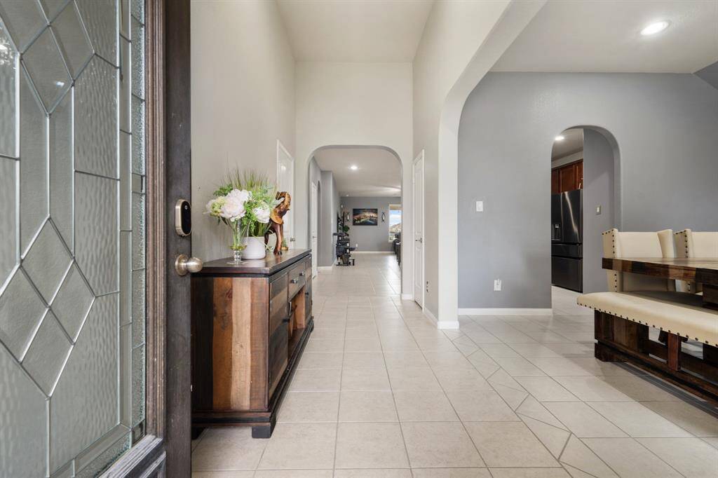 You'll be instantly greeted by beautiful tile floors.