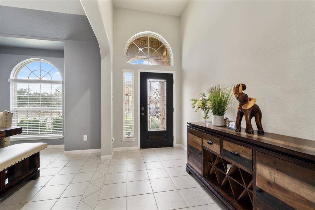 View of foyer and formal dining room.
