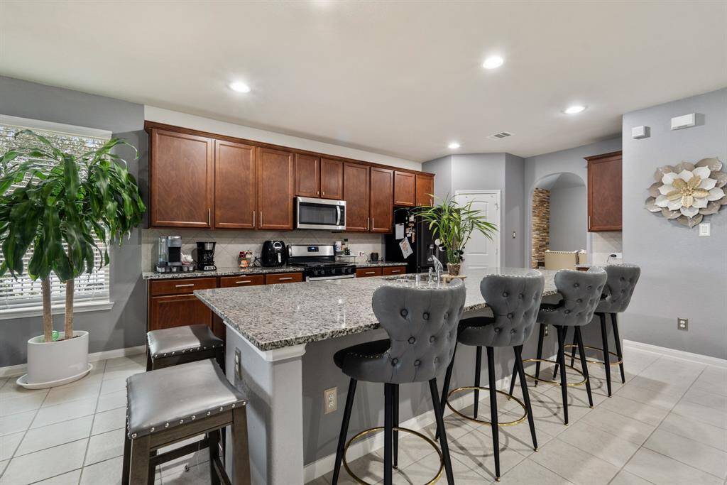 Walk past the foyer and arrive at your stunning kitchen!