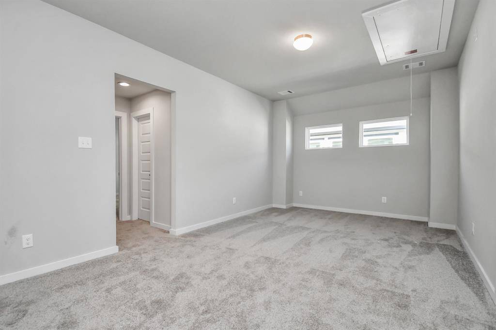 Another perspective of the loft area. Sample photo of completed home with similar floor plan. Actual colors and selections may vary.