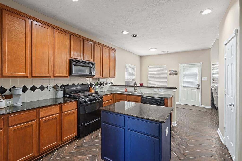This Island Kitchen is a Chefs Delight with Ample Storage and Counter Space