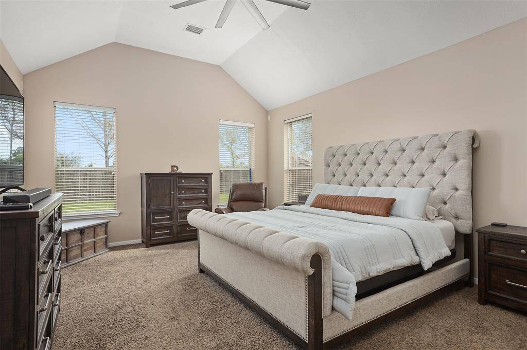 Large Enough for a Sitting Area, This Main Floor Primary Bedroom Creates the Perfect Retreat