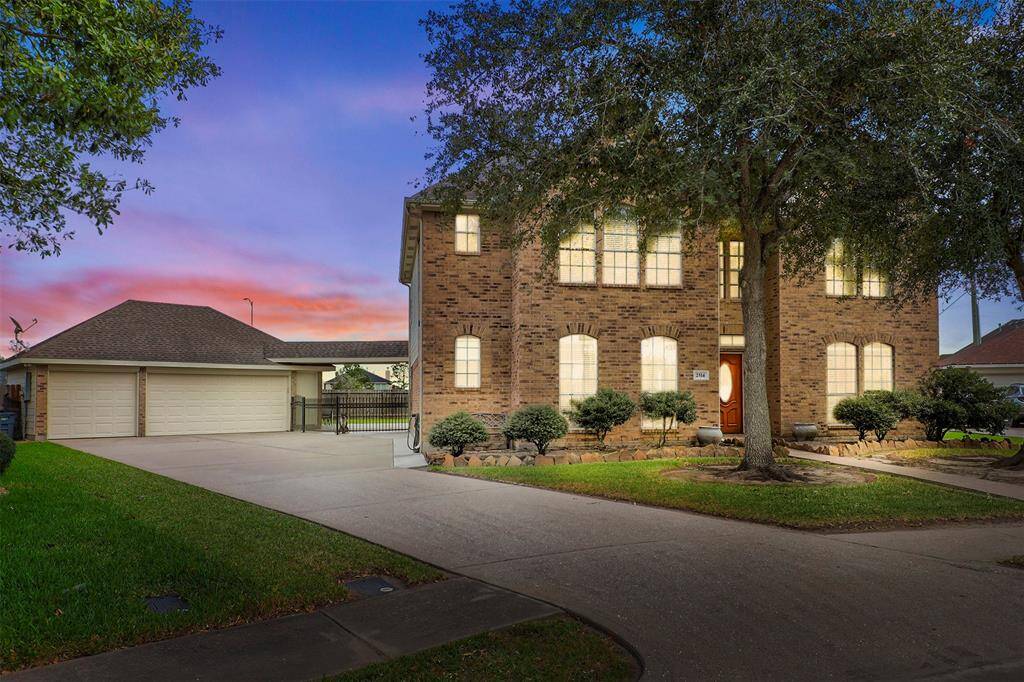 Stunning Twilight Picture of this 2-Story Gem with Lots of Features including the Huge Lot and 3-Car Garage!