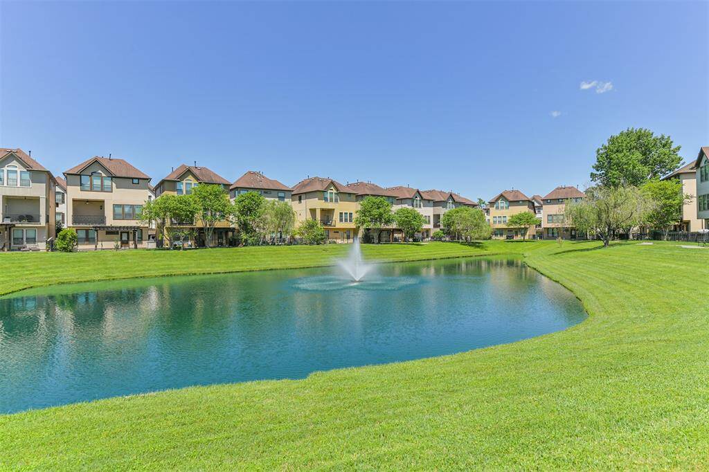 Beautiful pond behind the home.