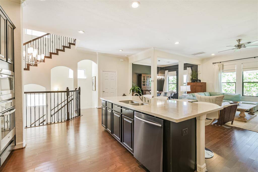 Super open concept with kitchen, family room and dining room close enough to entertain lots of company.
