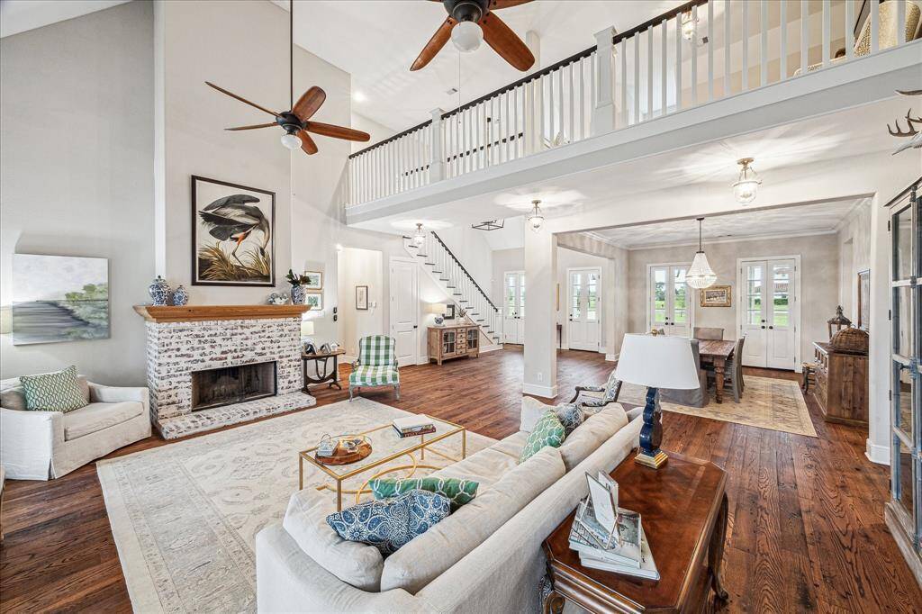 VIEW FROM THE BACK OF HOME TOWARDS THE FRONT ENTRANCE DISPLAYS THE EXPANSIVE LAYOUT