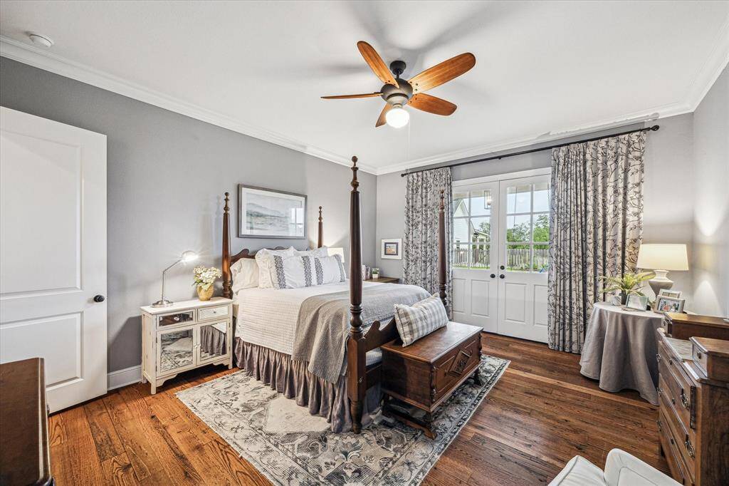 PRIMARY SUITE OFFERS CROWN MOLDING AND OPEN TO THE BACK YARD FOR LATE NIGHT DIPS IN THE POOL