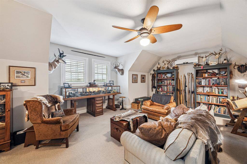 THIS ROOM IS HIDDEN AWAY ABOVE THE GARAGE- CAN BE USED AS ANOTHER BEDROOM, STUDY/LIBRARY WITH LOTS OF ATTIC STORAGE AVAILABLE TOO, MAN CAVE OR FAMILY GAME ROOM