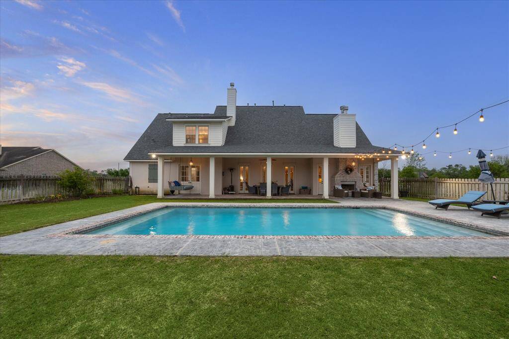 MAGNIFICENT BACK YARD! NEW ROOF TOO! MANY MEMORIES TO BE MADE IN THIS ENTERTAINING READY BACKYARD OASIS!