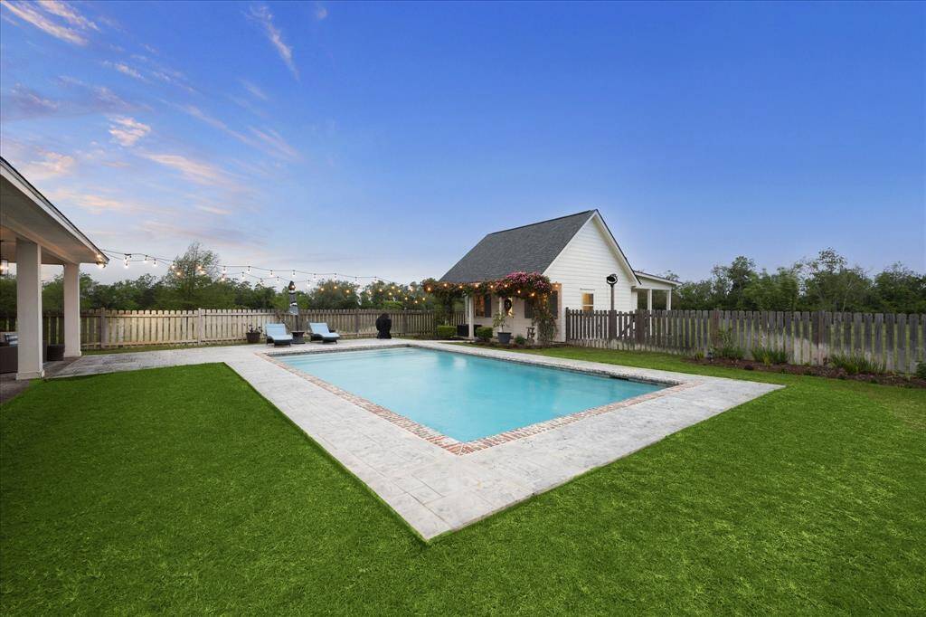 GREAT BACKYARD SPACE FULLY FENCED OFFERING LOTS OF ROOM FOR A PLAY SET AND PETS. SPRINKLER SYSTEM SURROUNDS THE HOME