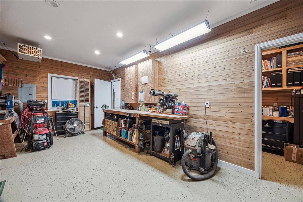 WORKSHOP AT ENTRANCE OF OUTBUILDING- ROOM TO THE RIGHT CAN BE ANOTHER OFFICE, STORAGE OR CLOSET OF CHOICE