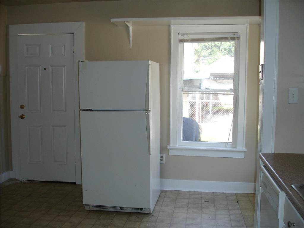 Right outside the back door is you large storage room.
