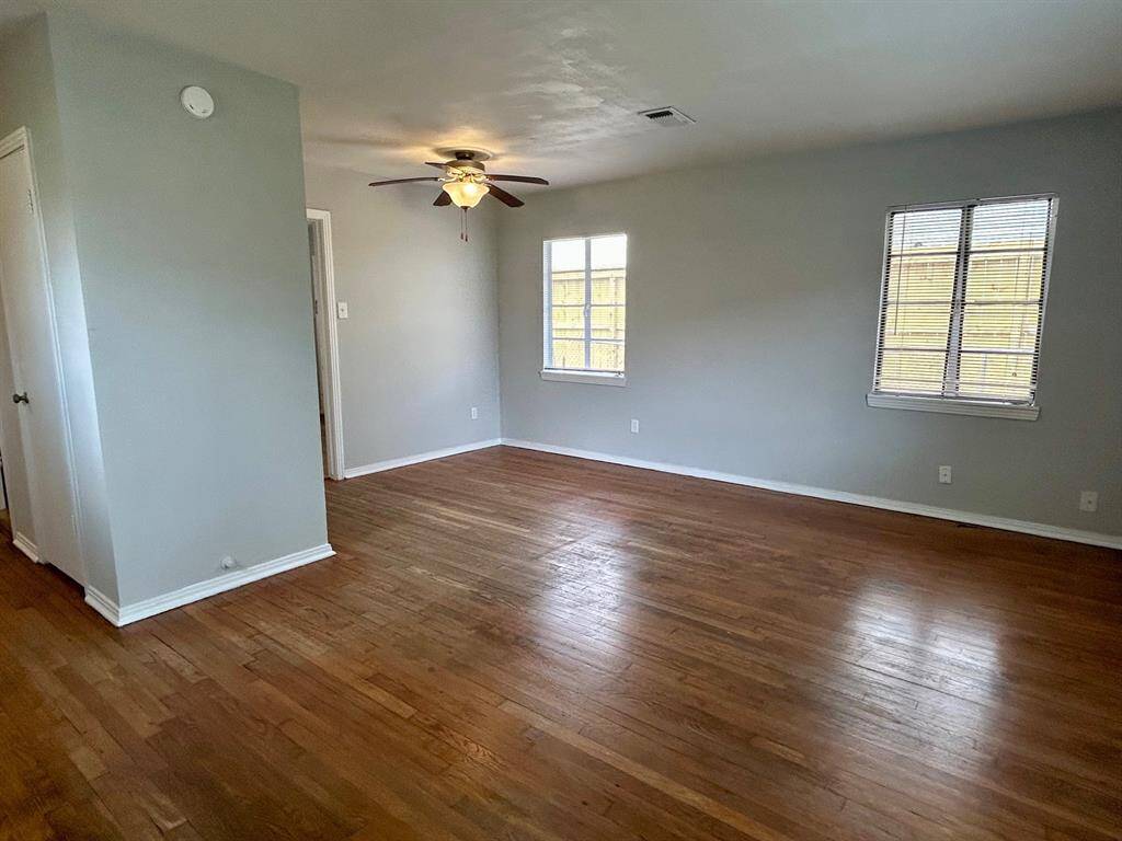 Another view of the living area toward dining.
