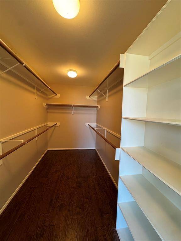 Walk in closet of master bedroom