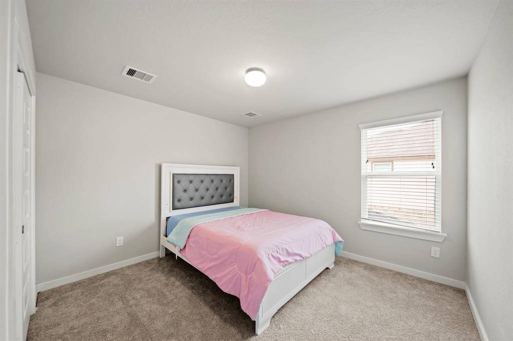 Your second bedroom offers a generous and inviting space that exudes comfort and versatility.