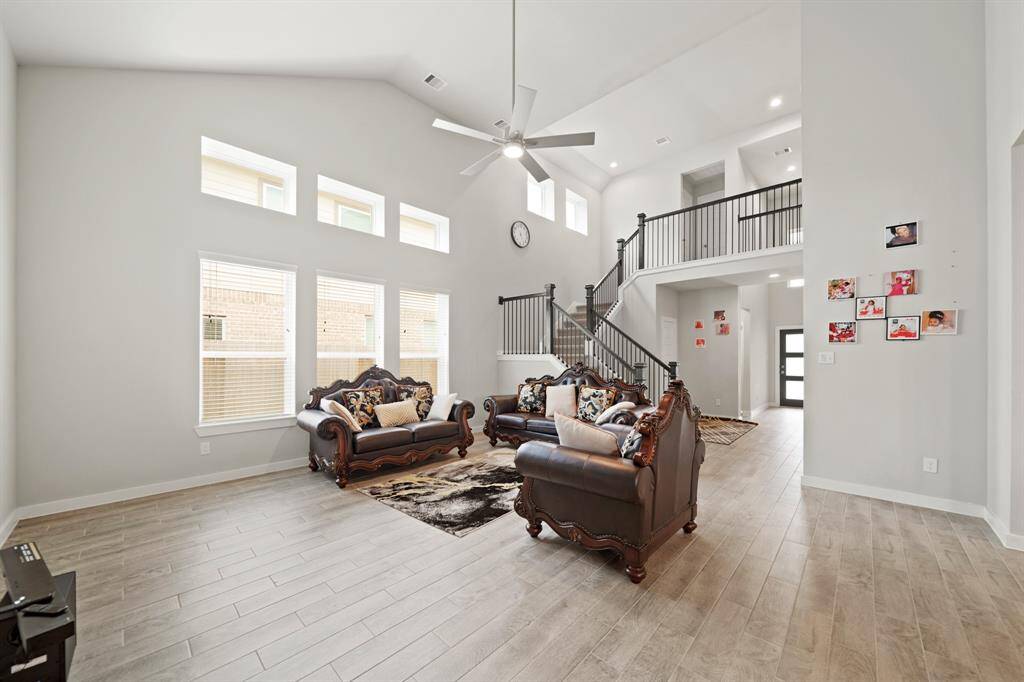 This open-concept floor plan is thoughtfully designed for entertaining, seamlessly connecting the kitchen, dining and living areas.