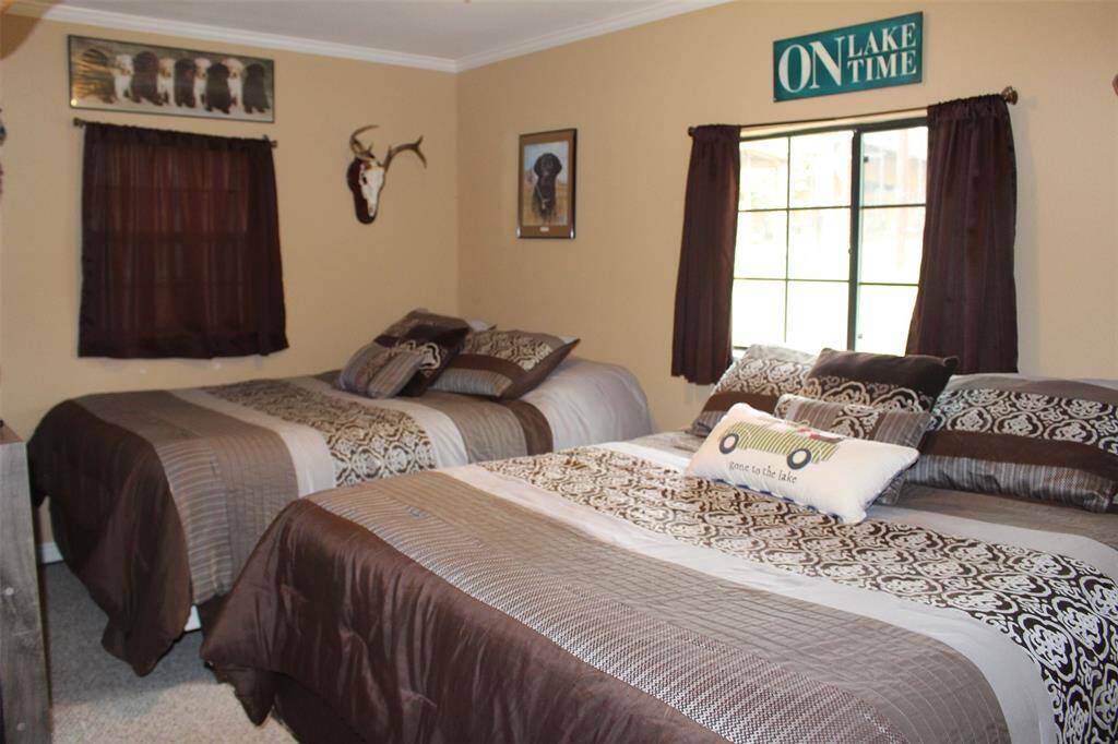 Guest room 2 has views of the front yard and has plenty of room  to meet all your needs. Currently sleeps 4