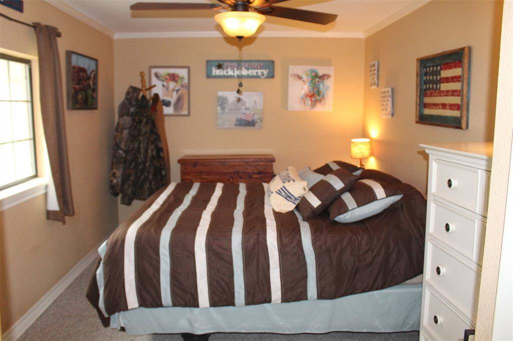 Guest room 2, loacted just off the entrance, has views of the front yard, and is located directly across from the guest bathroom. Currently sleeps 2.