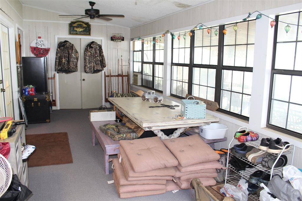 Utility Room located behind double doors in sunroom shown here. What will you do here?