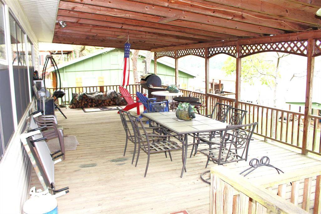 Step onto your 32x15 covered deck and take in the views. Watch the kids and fur babies play with ease with your fenced in back yard.