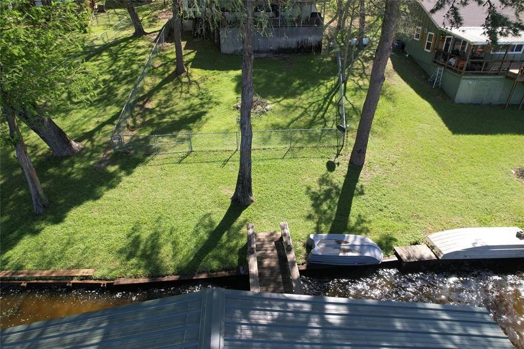 View of backyard from top of boat house.