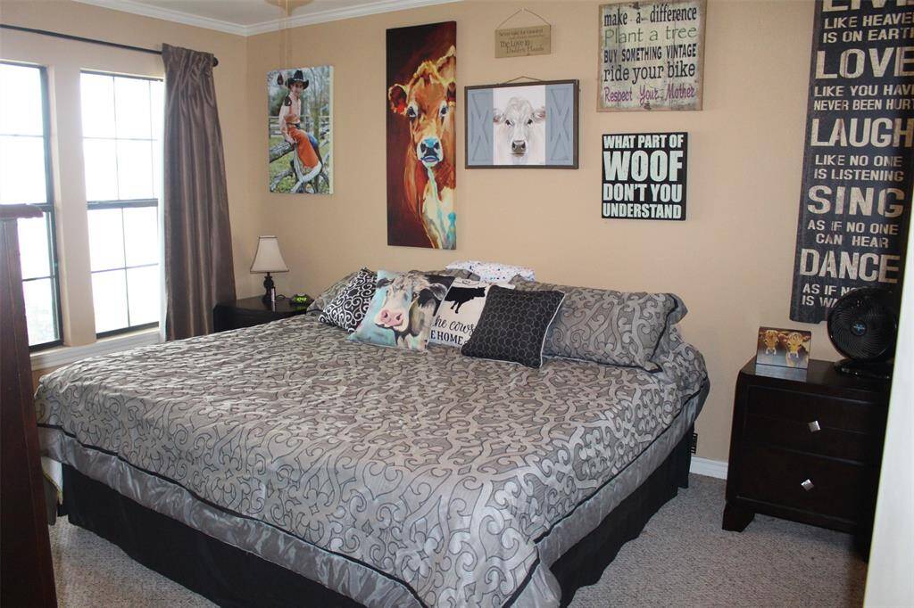 The Primary Bedroom supports a king size bed shown here.